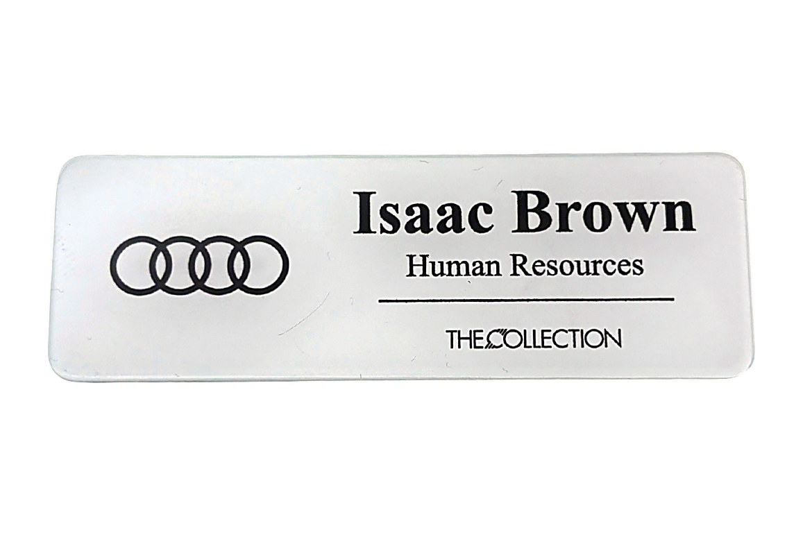 White-base clear acrylic name tag with a logo, name, title and property line